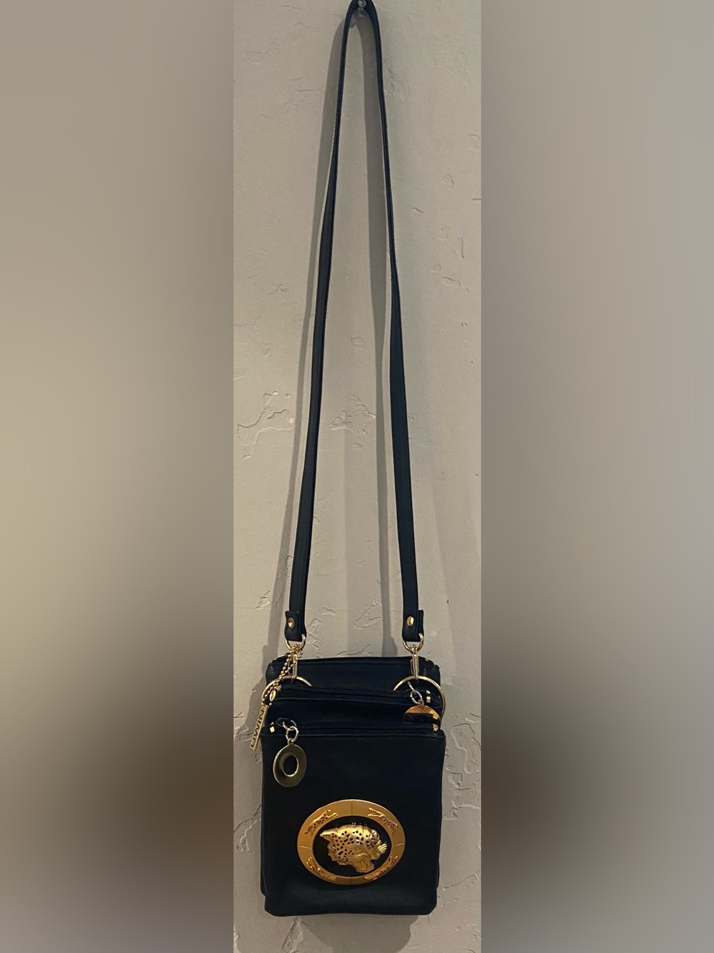 Vintage Nima Black Crossbody Bag with Gold Cheetah Emblem & Finishes.